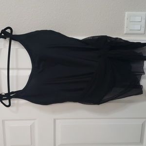 Black swimsuit with attached sheer cover waist to bottom. Molded cups.